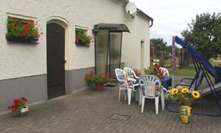 Ferienhaus mit Sitzgruppe